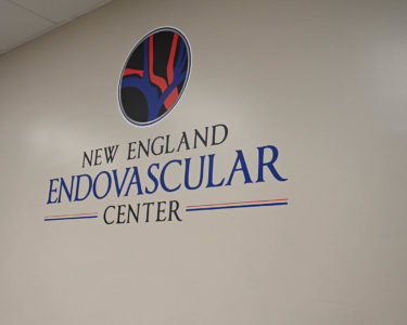 New England Endovascular Center Logo On Wall